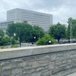 archive building behind trees